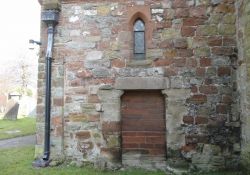 Existing weathered doorway needing opened up